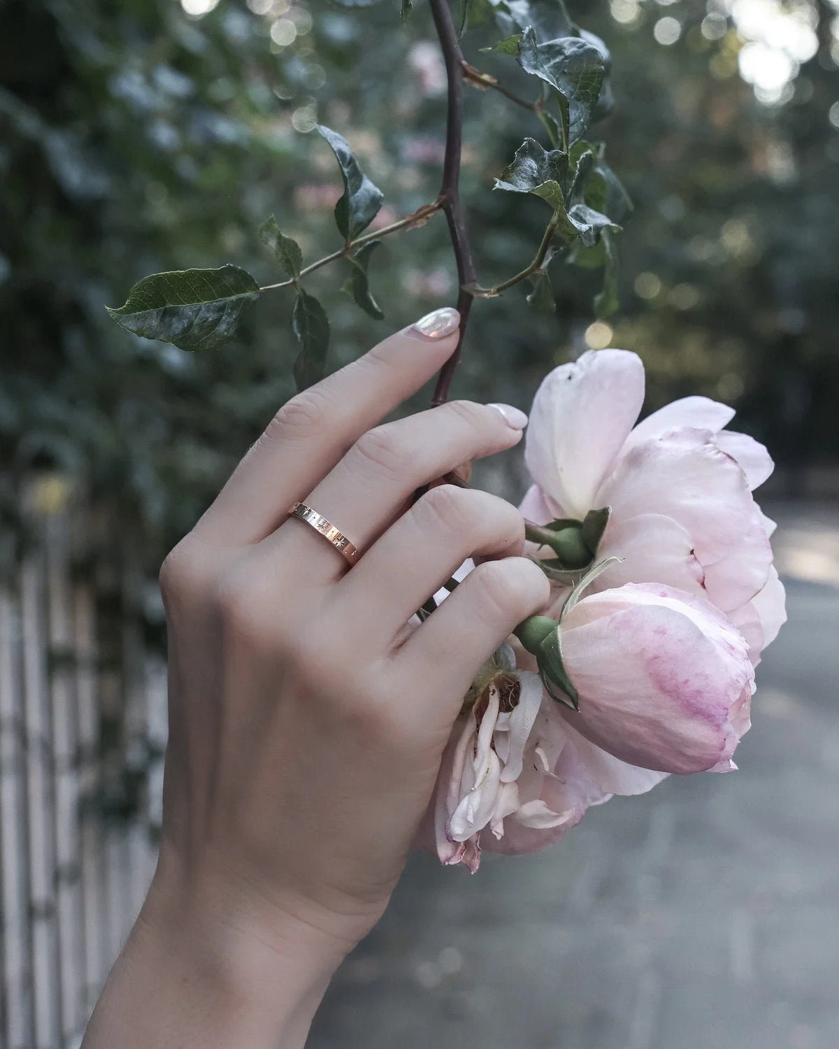 rose gold wedding ring worn on hand star set diamond band