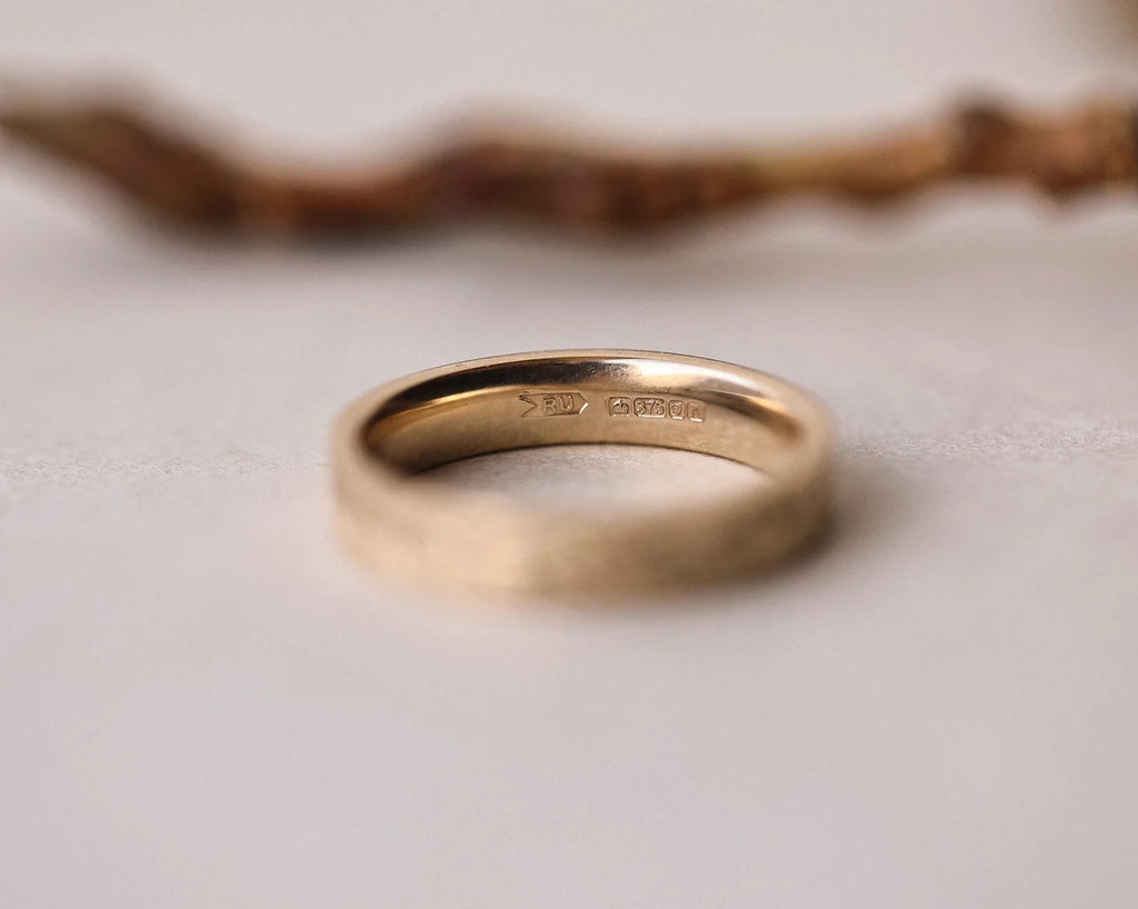 Back view of handmade 9ct yellow gold flat court wedding ring