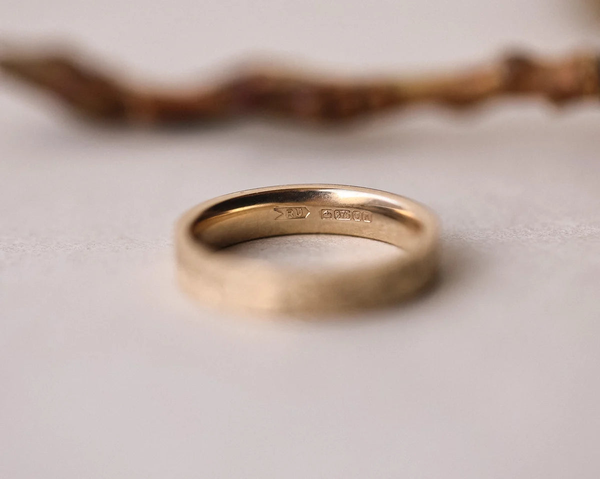 Back view of handmade 9ct yellow gold flat court wedding ring