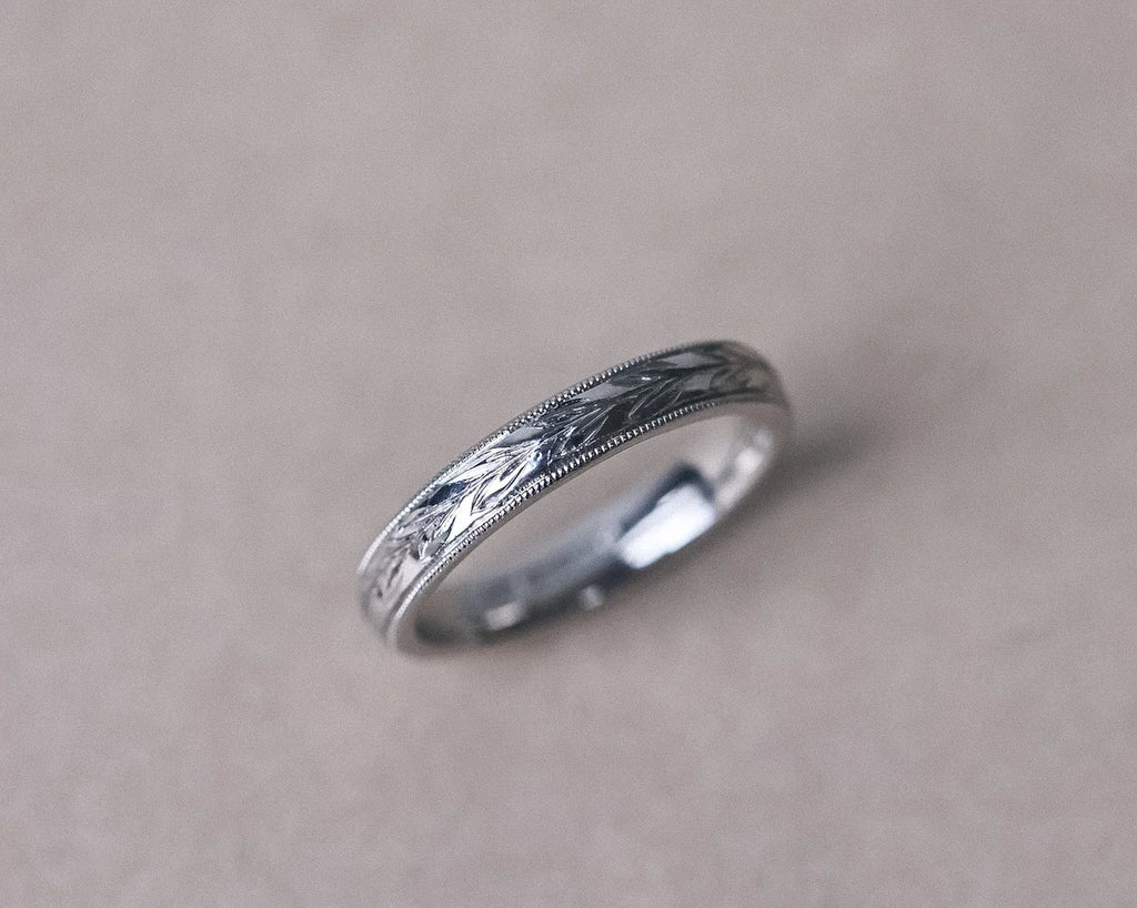 3mm olive leaf and milled edge wedding ring in platinum