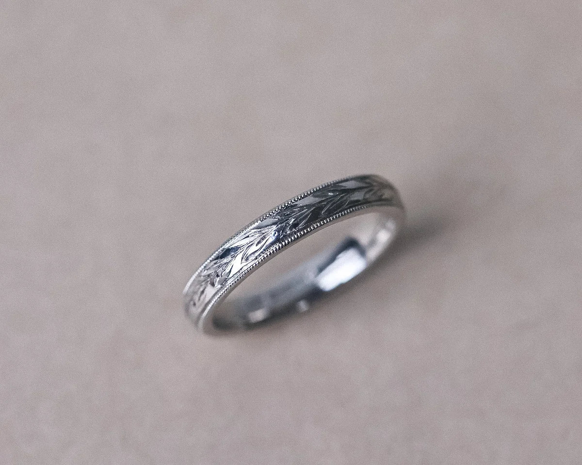 3mm olive leaf and milled edge wedding ring in platinum