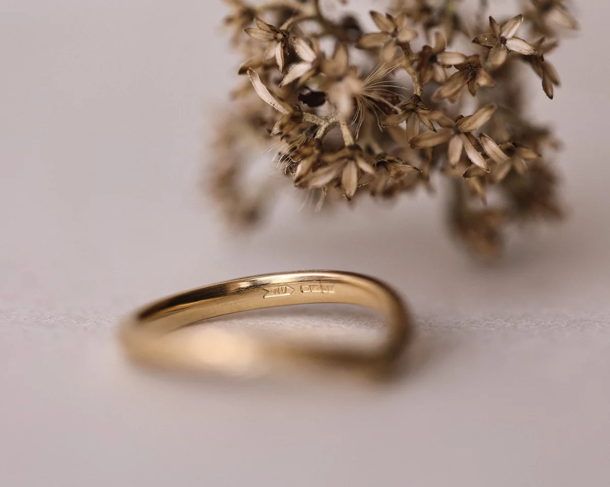 Side profile of 18ct yellow gold wishbone wedding band