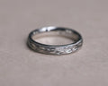3mm olive leaf and milled edge wedding ring in platinum