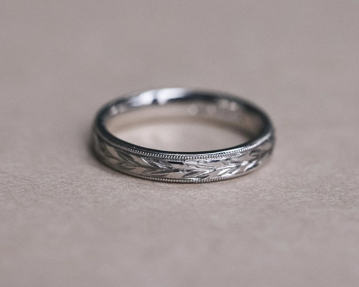 3mm olive leaf and milled edge wedding ring in platinum