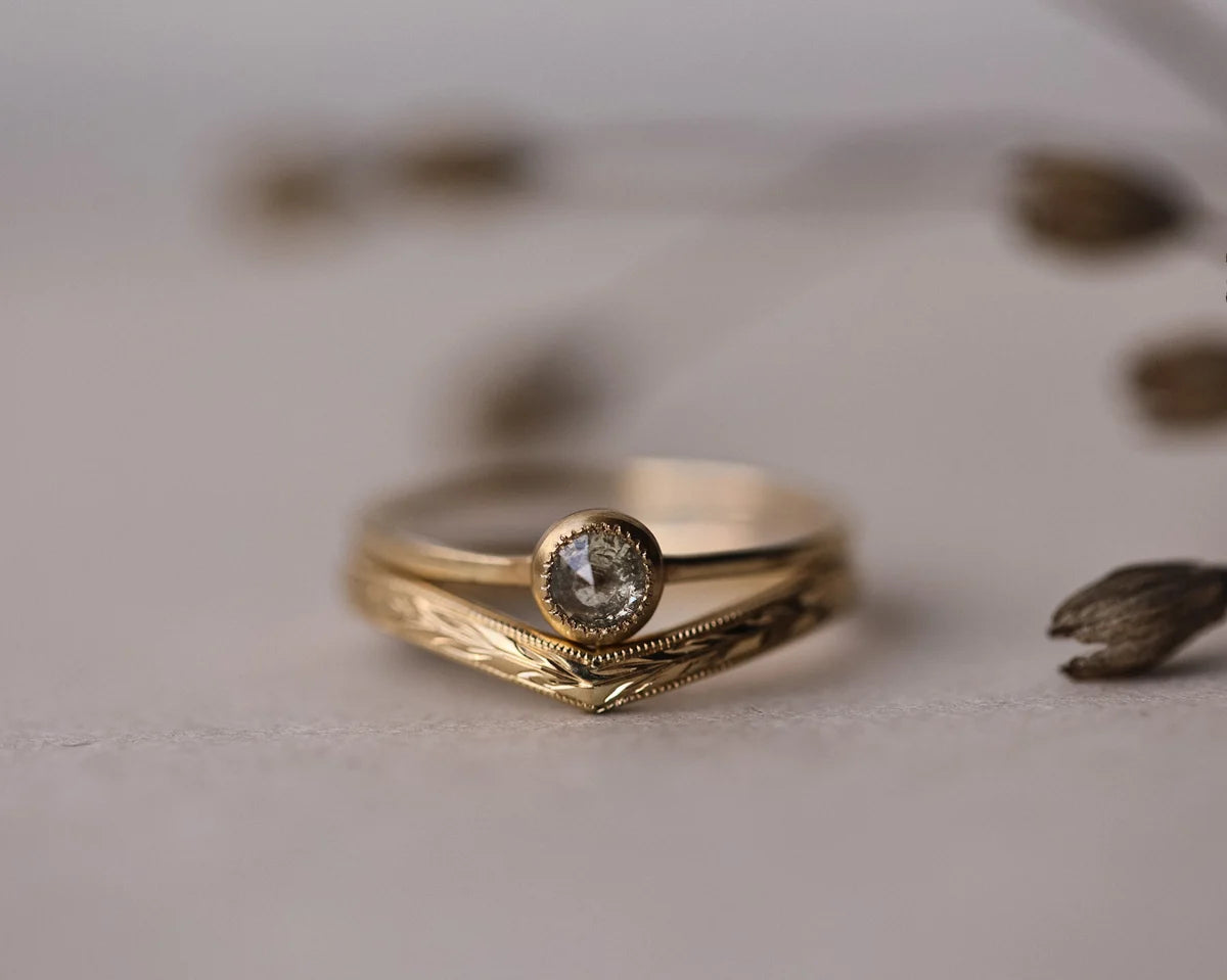 Olive leaf wishbone ring stacked with rose-cut diamond engagement ring