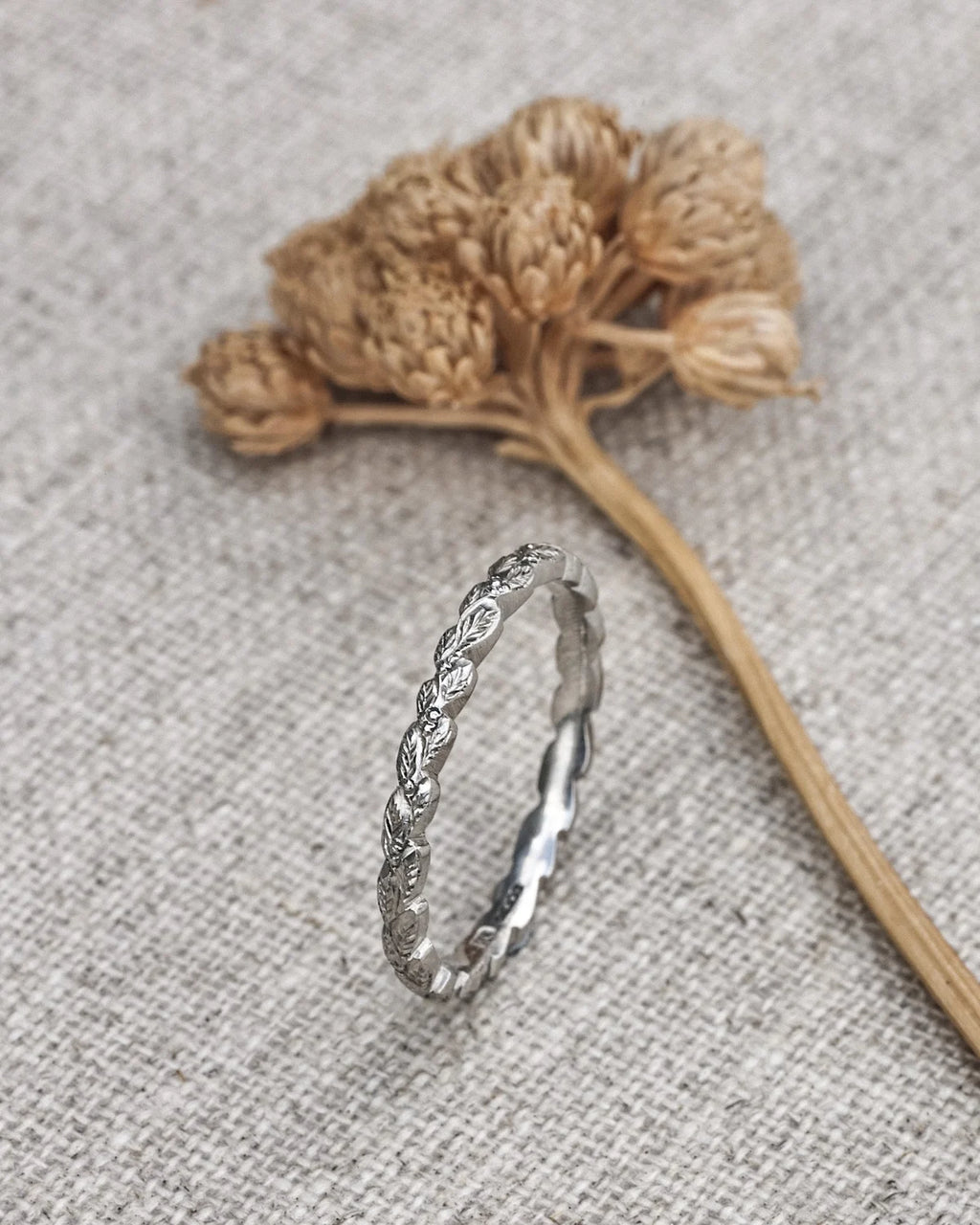 laurel leaf carving detail platinum wedding ring 2mm band