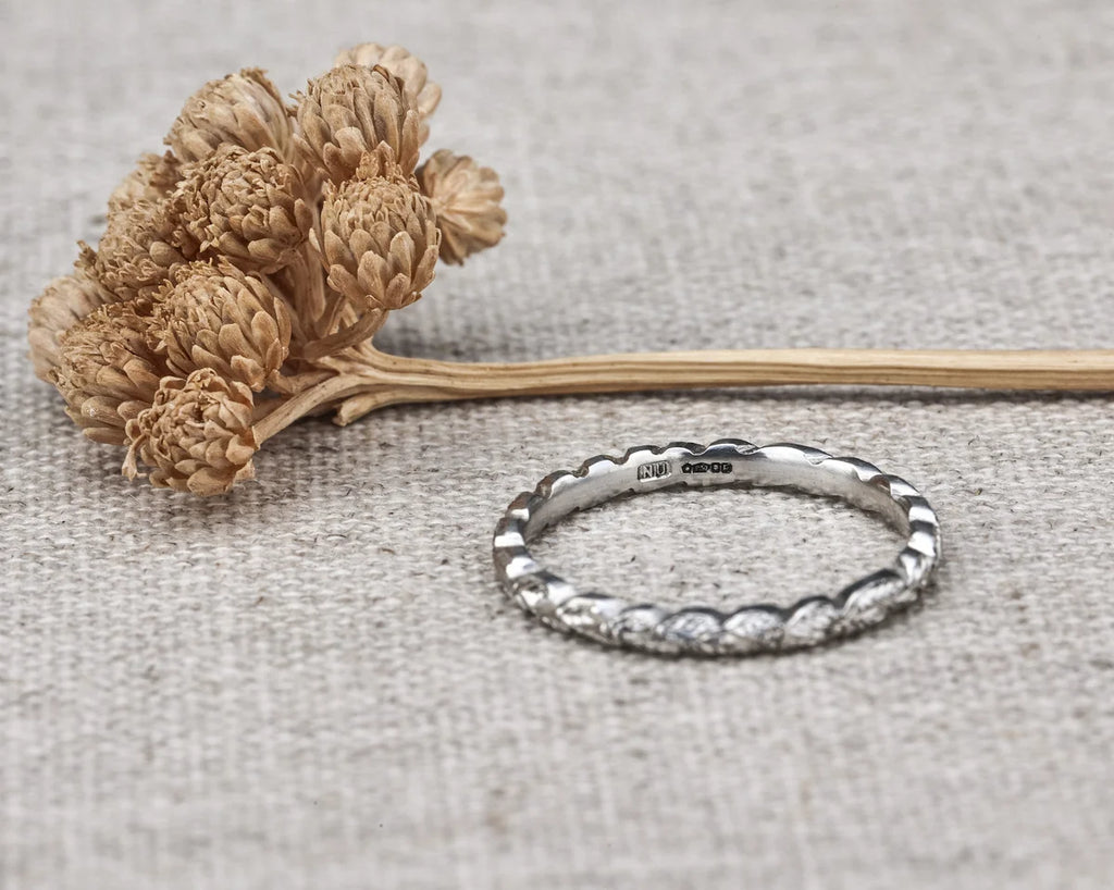 fine 2mm platinum band carved laurel ring side view