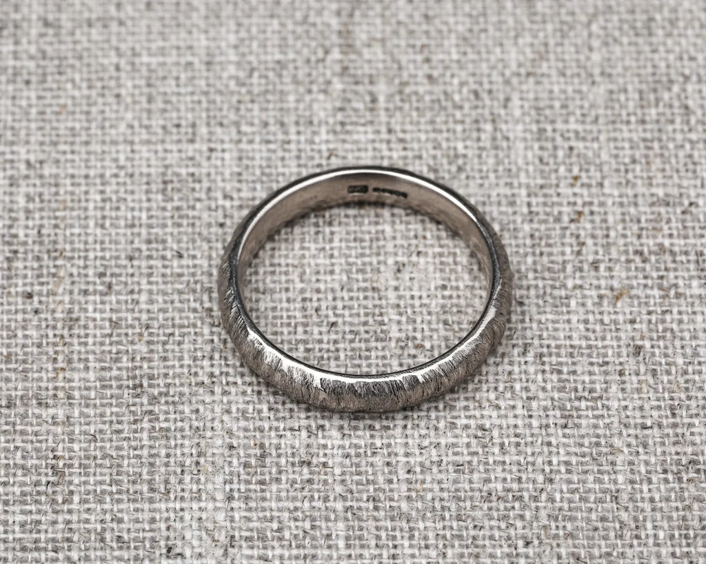 4mm white gold band textured ring side view
