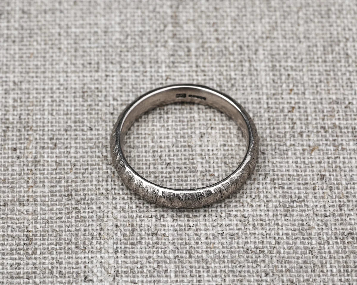 4mm white gold band textured ring side view
