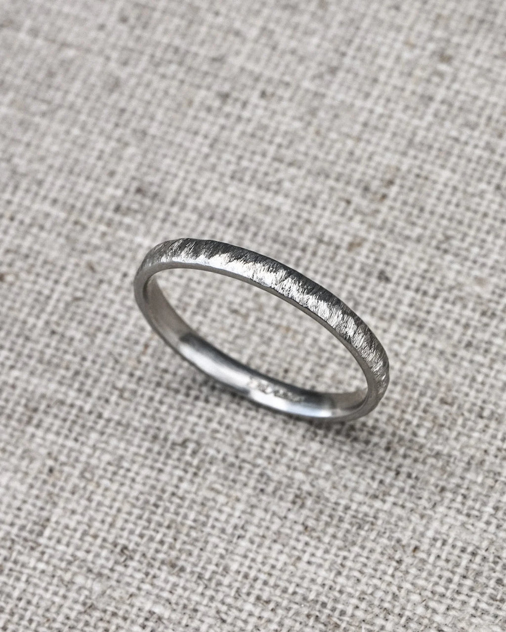 organic platinum wedding band horn texture minimalist design