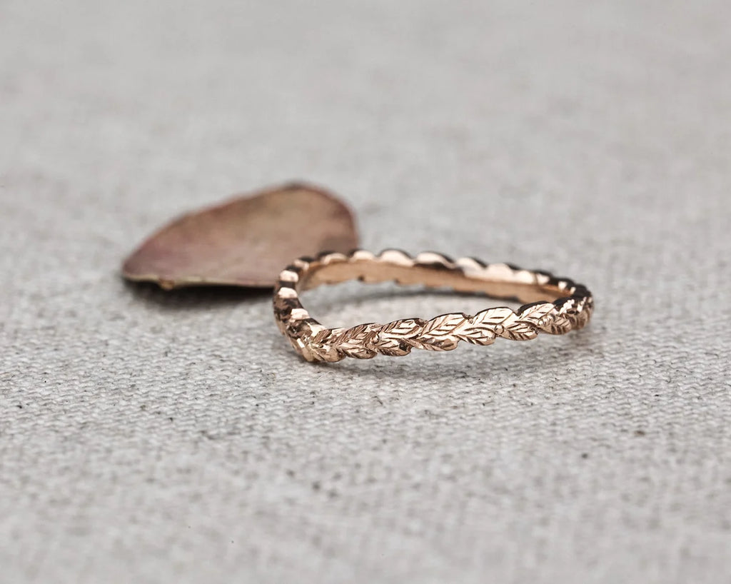 side view 2mm rose gold wishbone band laurel carved detail