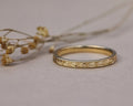 2mm olive leaf and milled edge flat court wedding ring in 18ct yellow gold