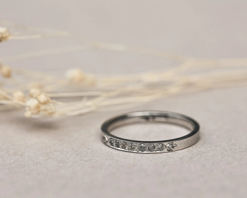 engraved leaf motif platinum band close up