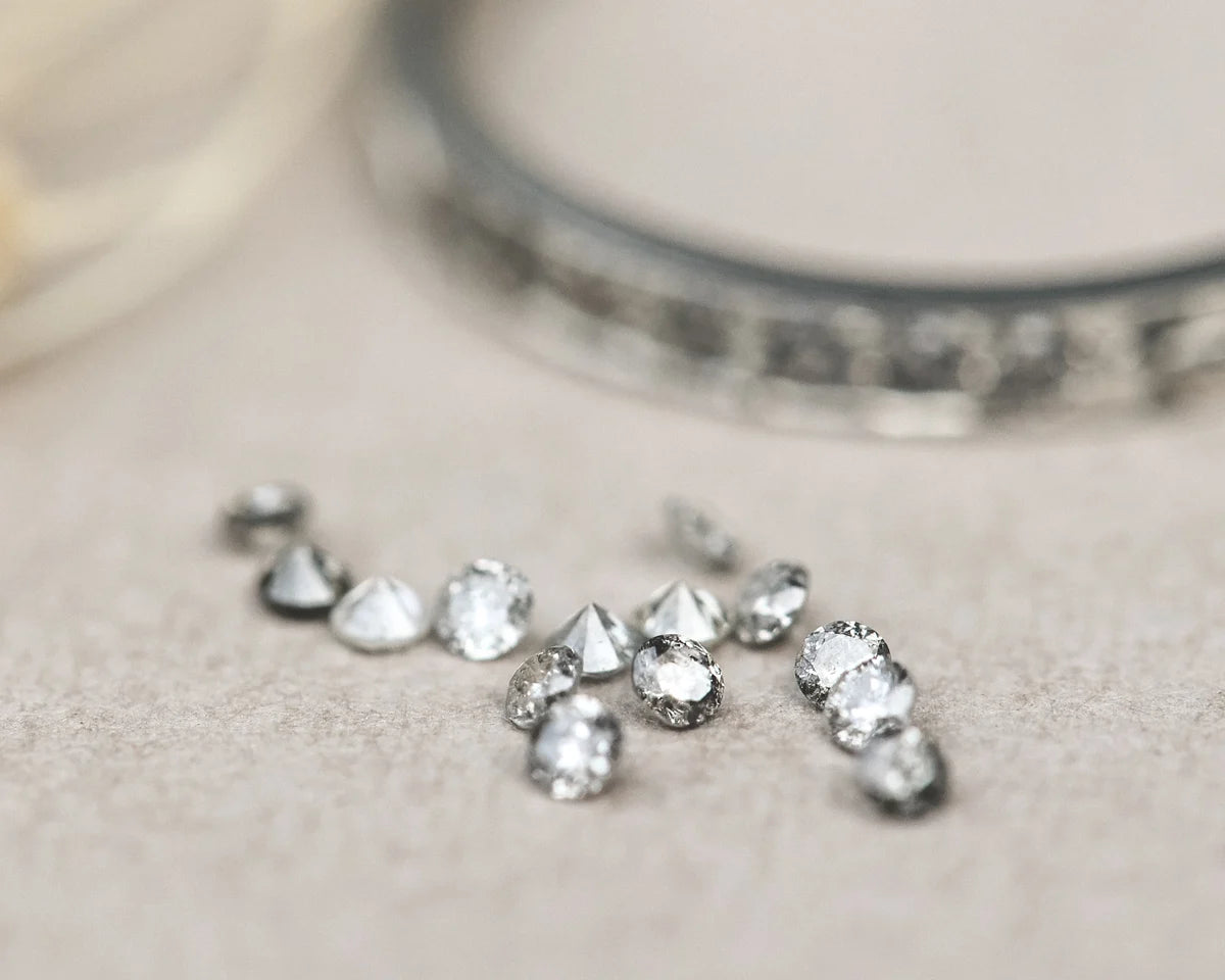  diamonds gemstones on a neutral background