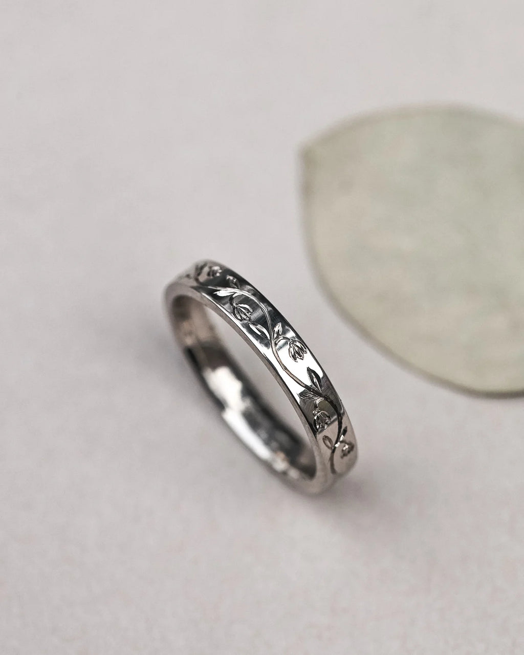 minimal textured surface engraved flower ring