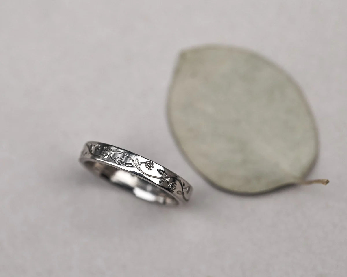 snowdrop engraved ring white gold flat court wedding band
