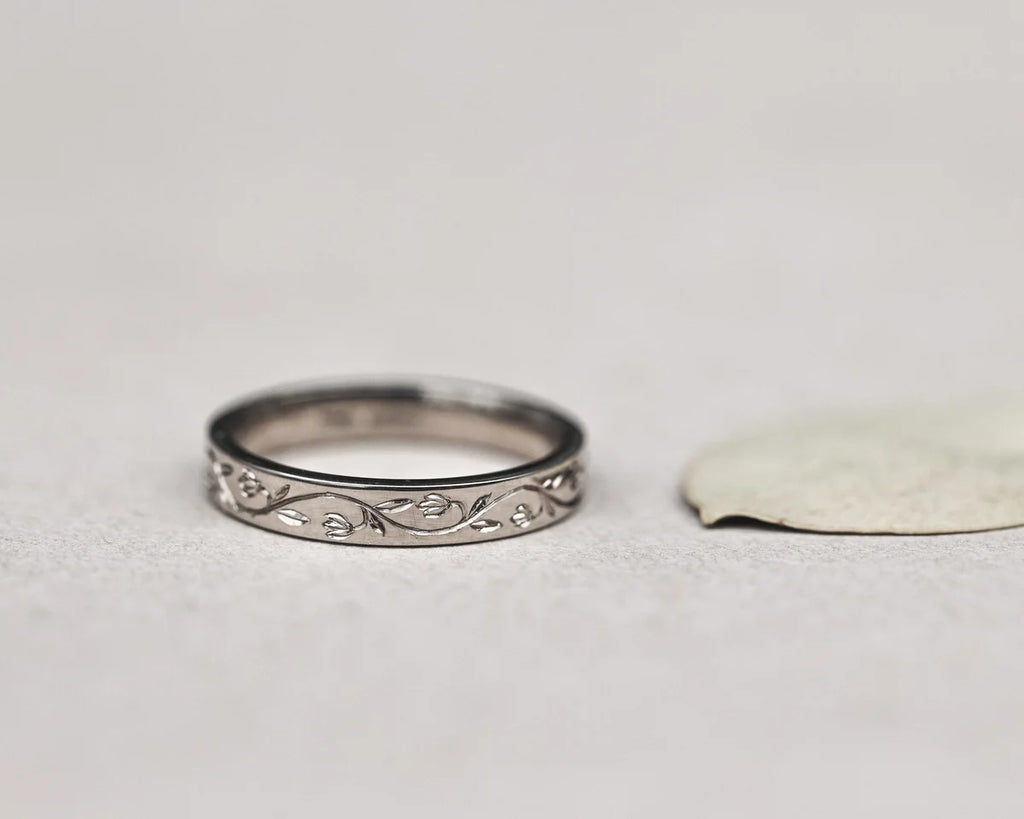 snowdrop flower pattern engraving white gold band detail