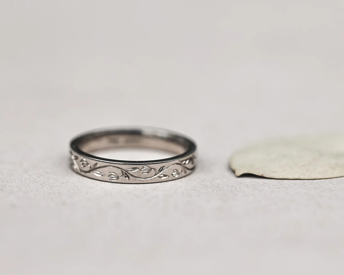 snowdrop flower pattern engraving white gold band detail