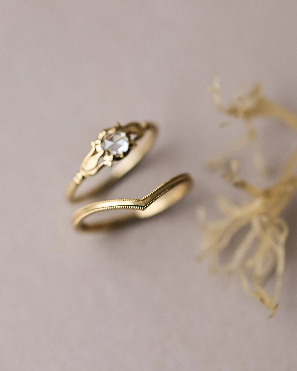18ct yellow gold rose-cut diamond ring shown with matching wishbone wedding band