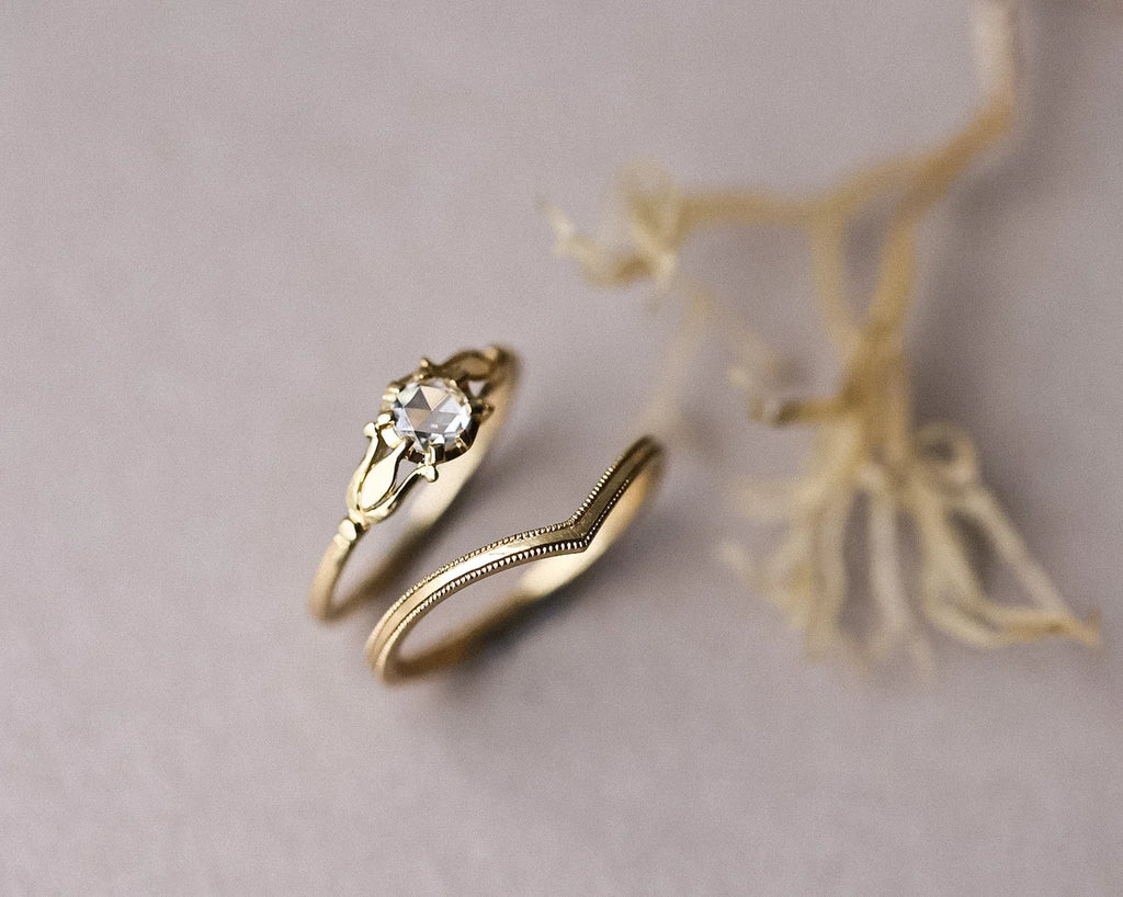 18ct yellow gold rose-cut diamond ring shown with matching wishbone wedding band