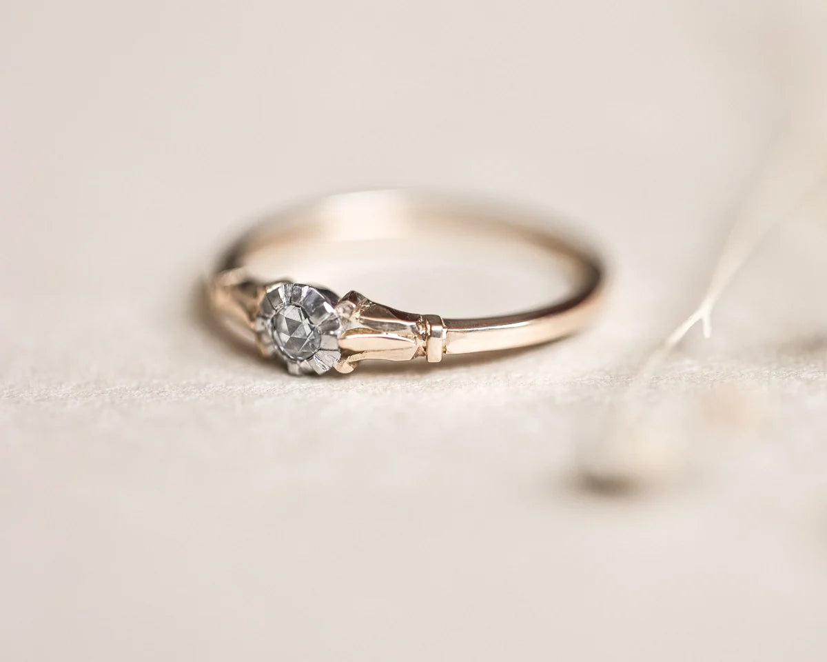 fleur de lys engraving detail gold band diamond ring