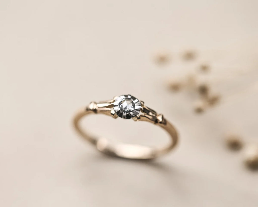 rose cut diamond ring worn on hand gold and platinum