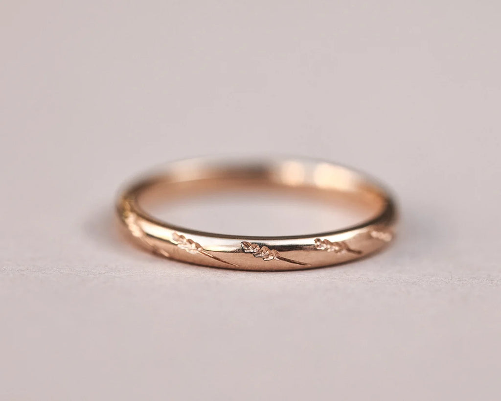fine 2mm rose gold band engraved barleycorn ring side view
