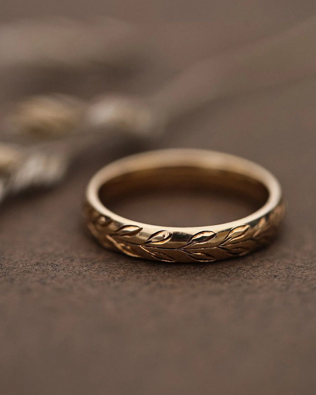 Hand engraved olive leaf court ring in 9ct yellow gold