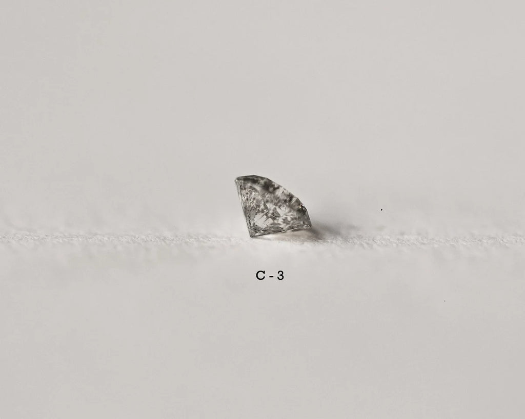 Diamond on a gray background with 'C-3' marking
