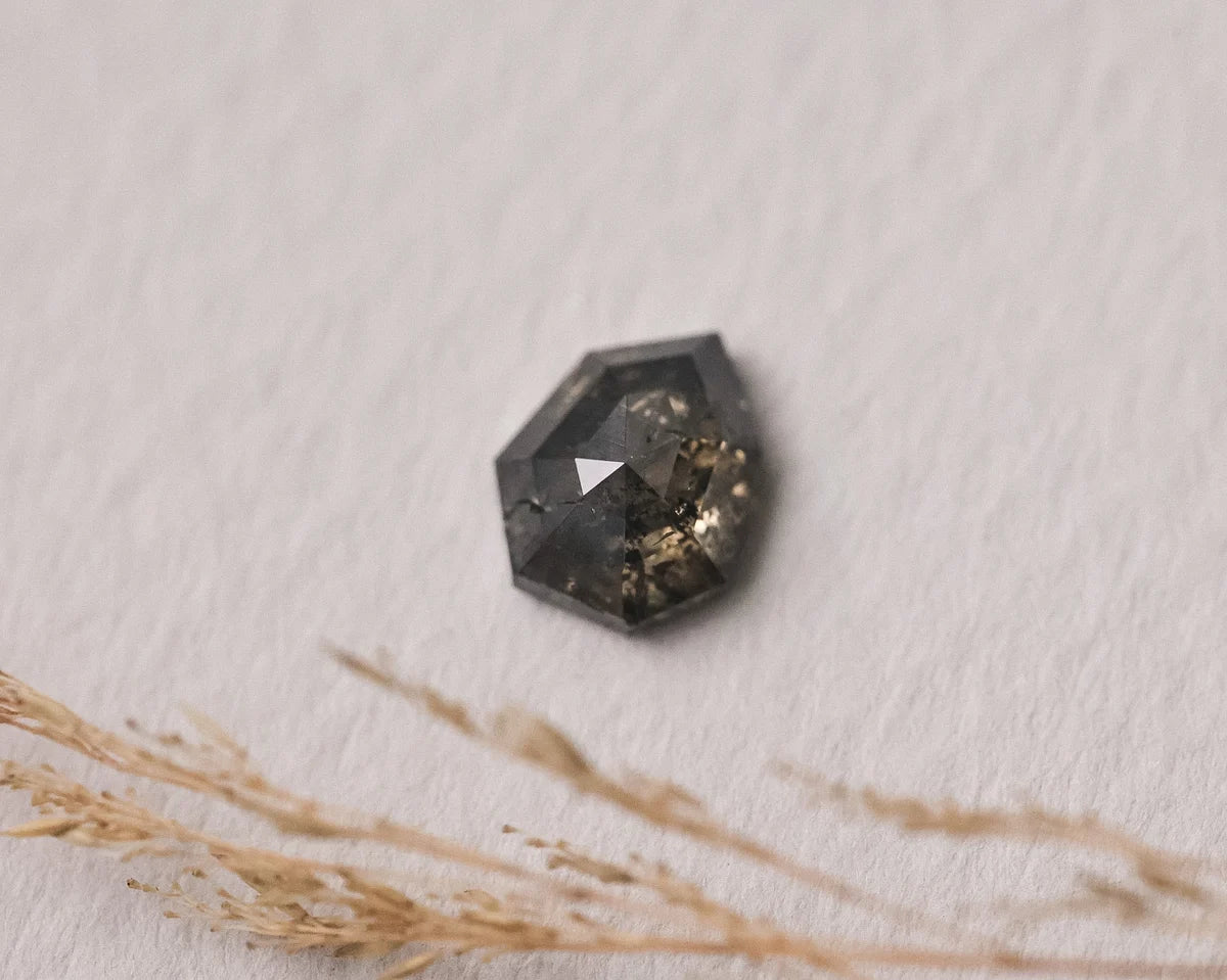 Close-up of grey rose-cut diamond option A with natural inclusions