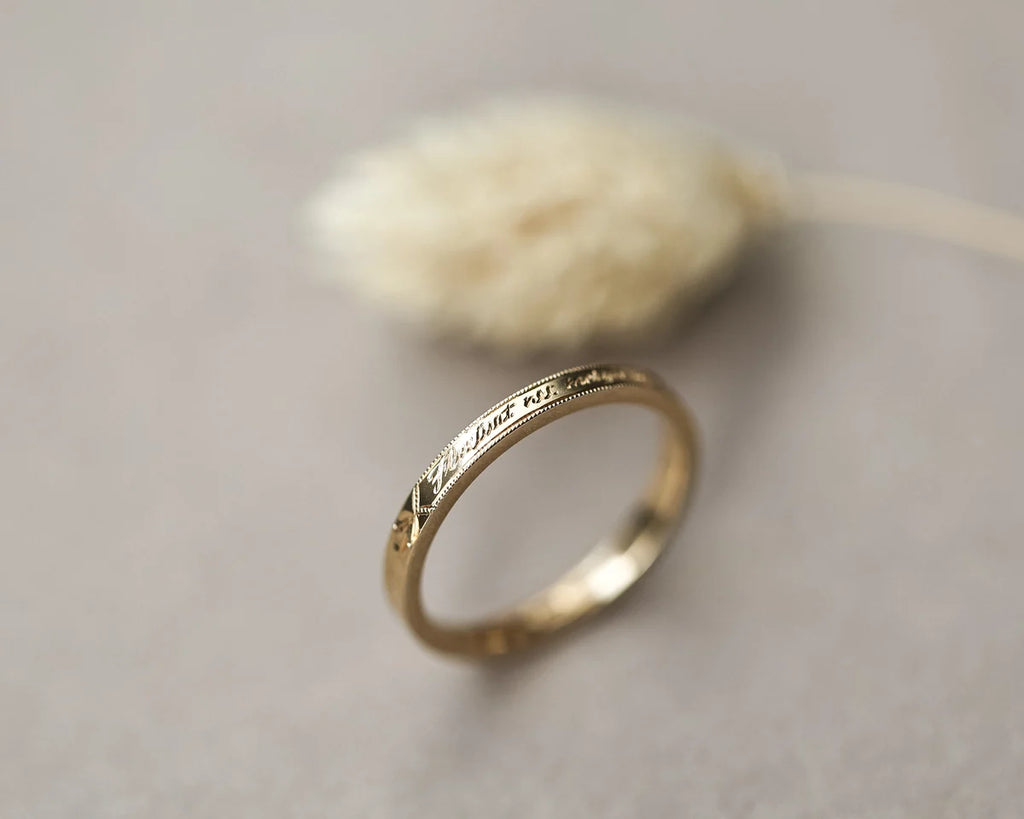 latin engraved wedding ring 18ct yellow gold 2mm flat court milled edge