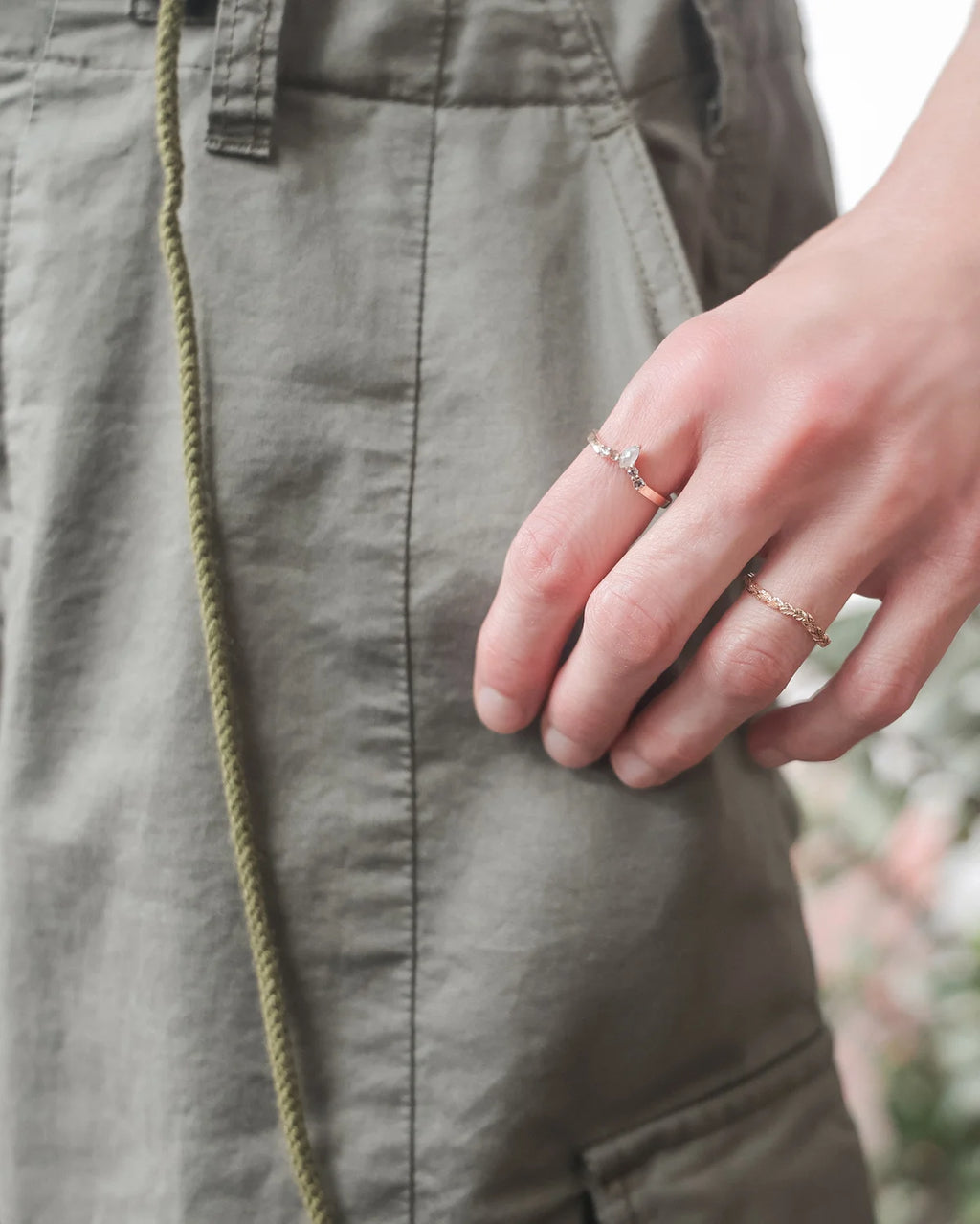 Milky grey marquise diamond wishbone ring worn on hand