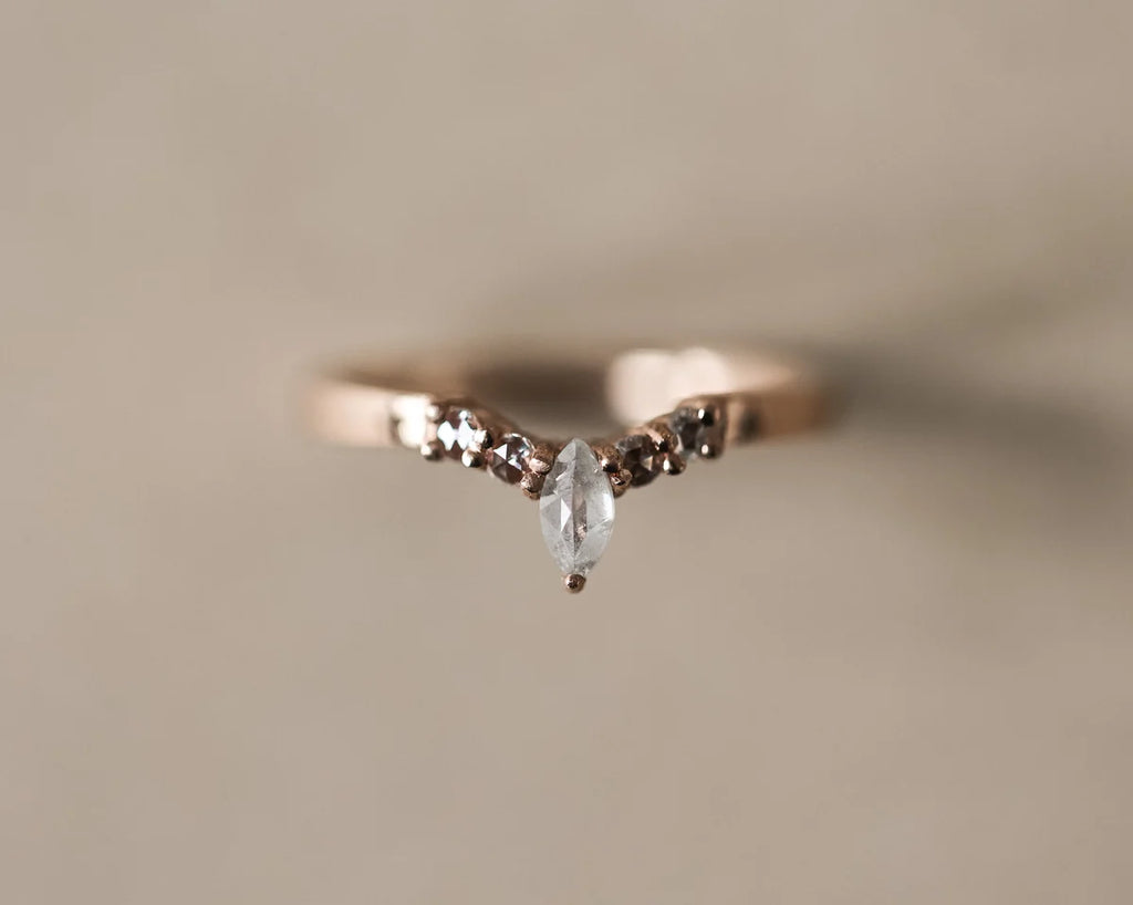 Front view of marquise diamond wishbone ring with rose-cut side diamonds