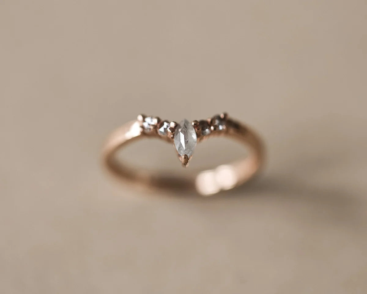 Close-up of one-of-a-kind diamond wishbone ring in 18ct rose gold
