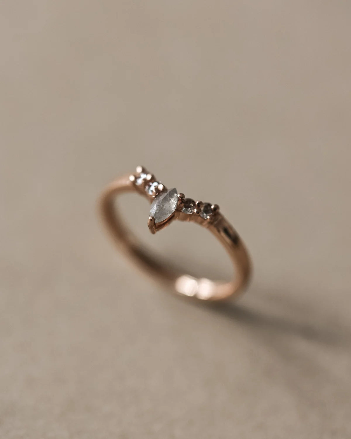 One-of-a-kind rose gold wishbone ring with natural grey diamond