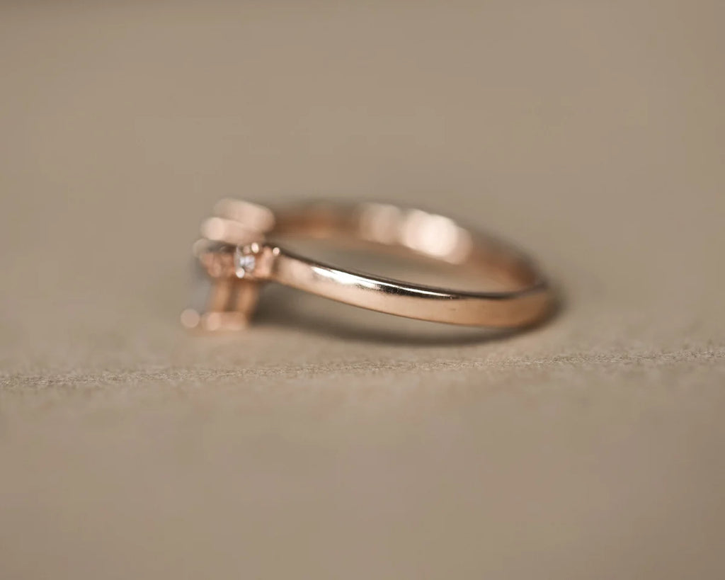 Back view of handmade rose gold diamond wishbone ring