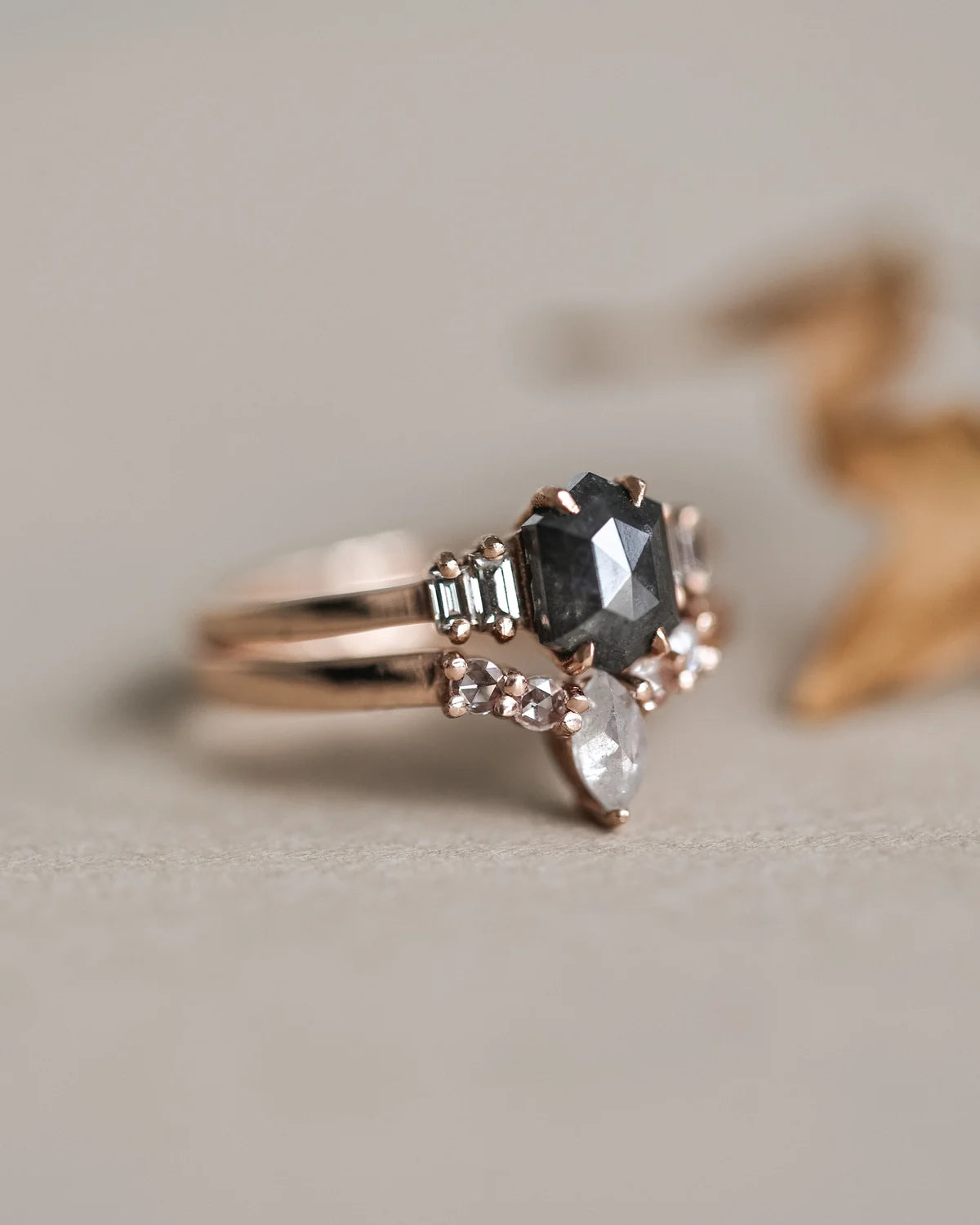 Detailed view of milky grey marquise diamond and rose-cut white diamonds