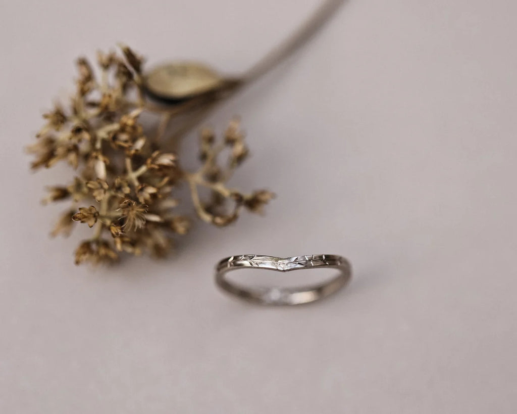 Front view of 18ct white gold willow leaf engraved wishbone ring