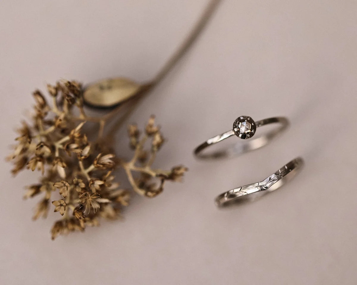 Champagne rose-cut diamond ring paired with wishbone wedding band
