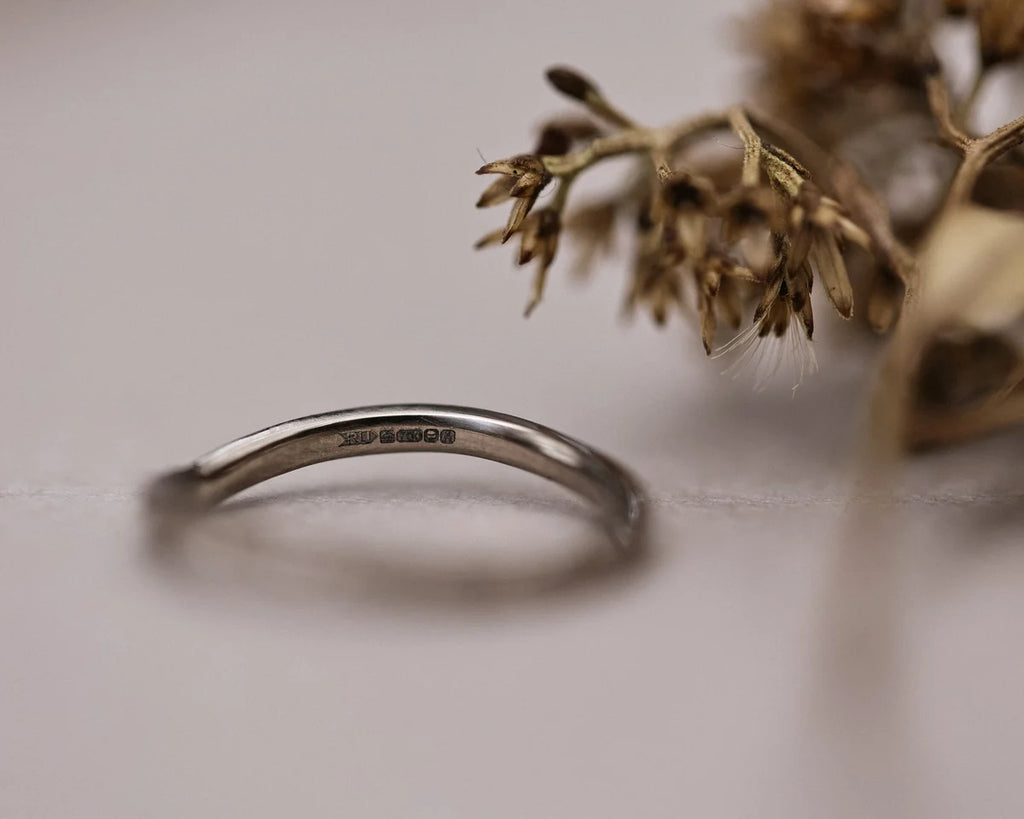 Side profile of 18ct white gold willow leaf wishbone ring