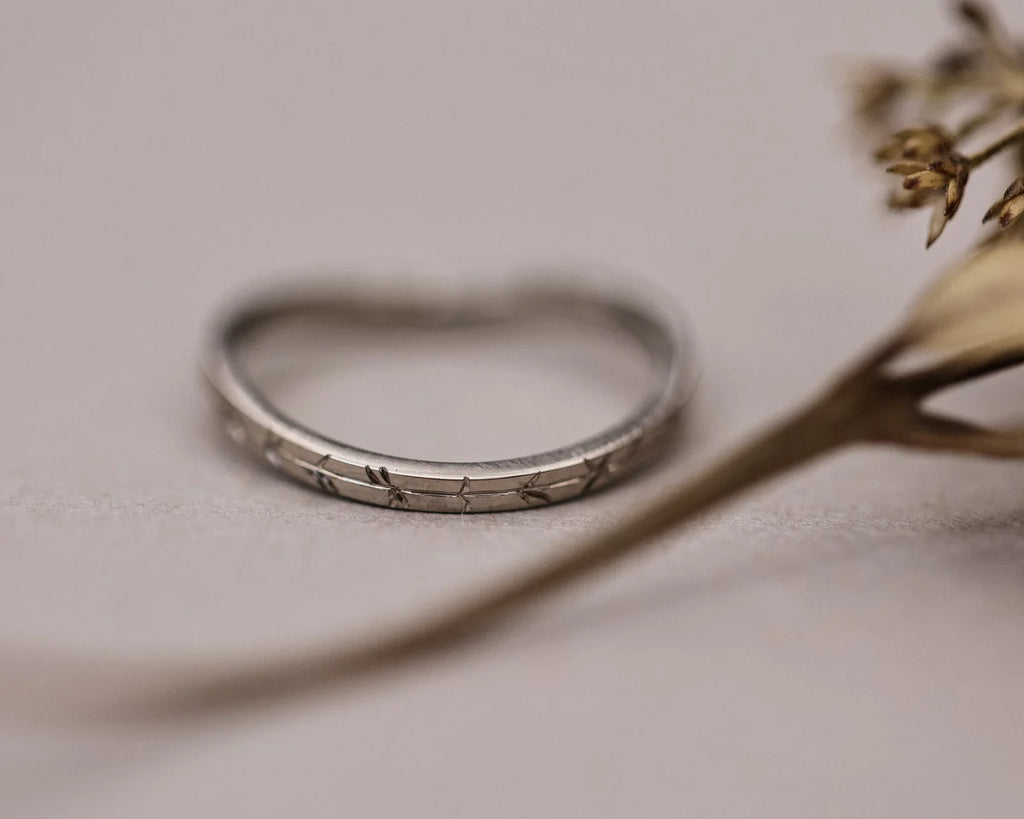 Back view of handmade white gold wishbone ring with willow leaf engraving