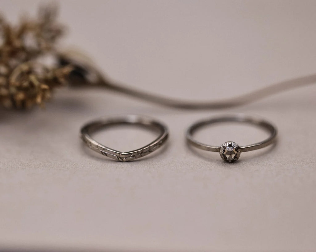 Willow leaf wishbone ring paired with diamond engagement ring