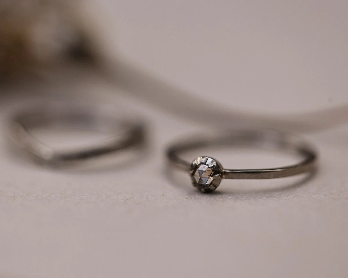18ct white gold champagne diamond ring shown beside matching wedding band