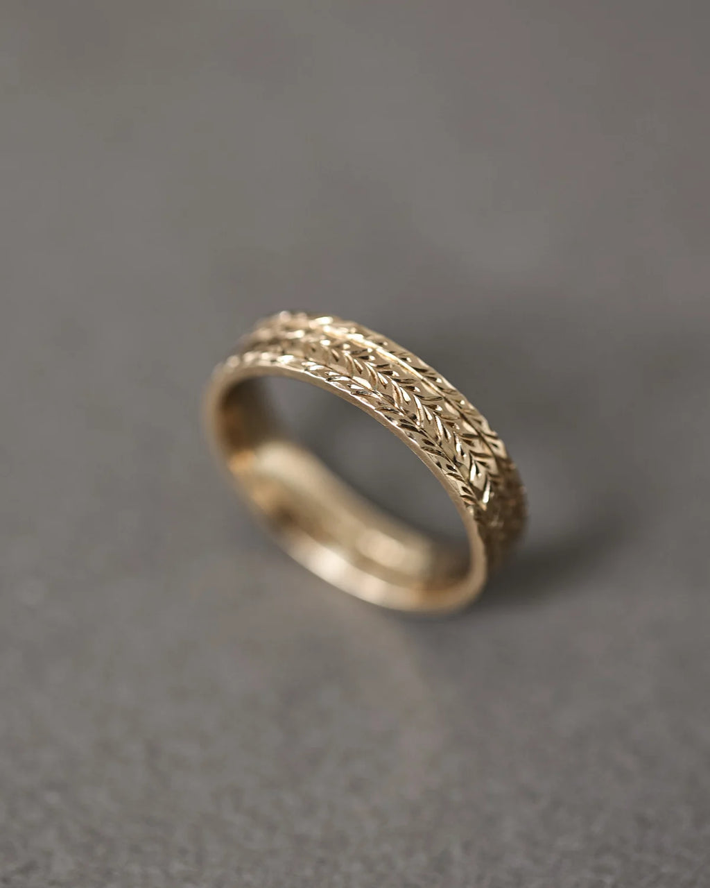 linear herringbone pattern detail gold engraved ring
