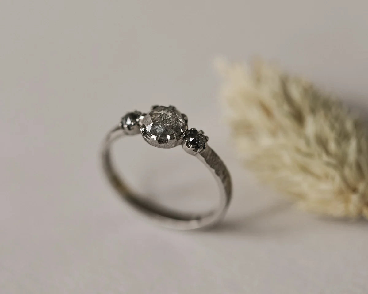 One-of-a-kind pale grey diamond trilogy ring in platinum