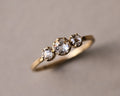 18ct yellow gold rose-cut diamond trilogy ring with three white diamonds