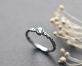 Platinum ring with carved leaf motif rose cut diamond 