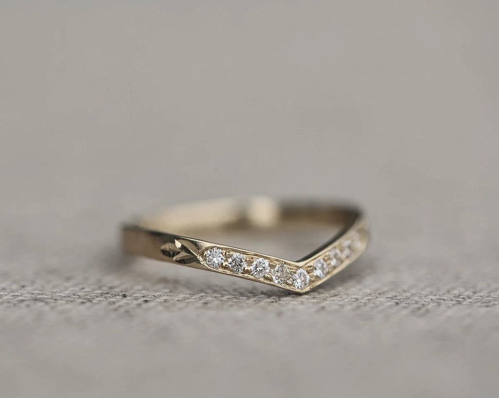 Low front view of diamond wishbone semi-eternity ring