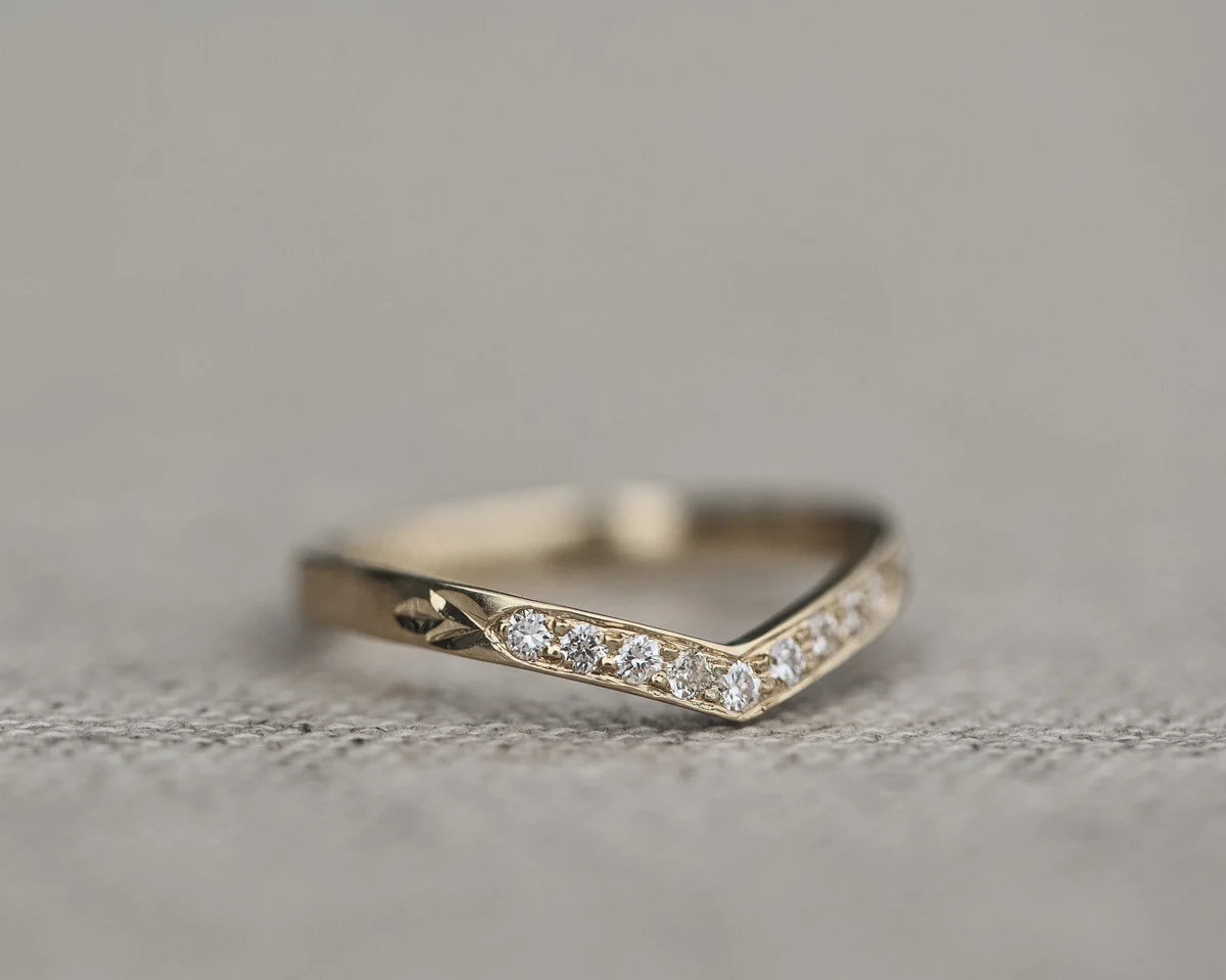 Low front view of diamond wishbone semi-eternity ring