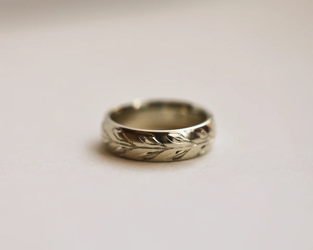 6mm olive leaf engraved court wedding ring in 18ct white gold